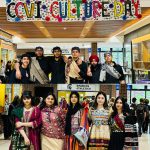 This photo features a collage of photos of students dressed inc ultural attire in school's foyer under a banner that reads "CCVI Cultural Day".