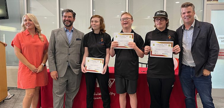 Staff and students stand for a photo at the YMCA Guelph.